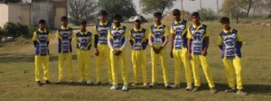 "Cricket team standing together in uniform for a group photo