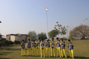 Cricket players lined up together for a team photo
