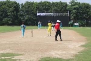 Cricket player running on the ground during play