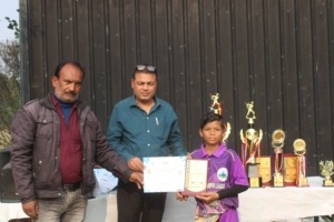 Cricketer receiving achievement certificate