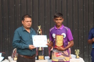 Young player showing certificate