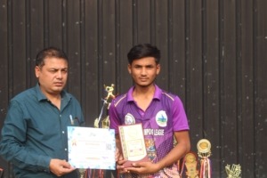 Young player showing certificate